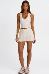 Soft Active Crossover Pleated Mini Skort in Coconut